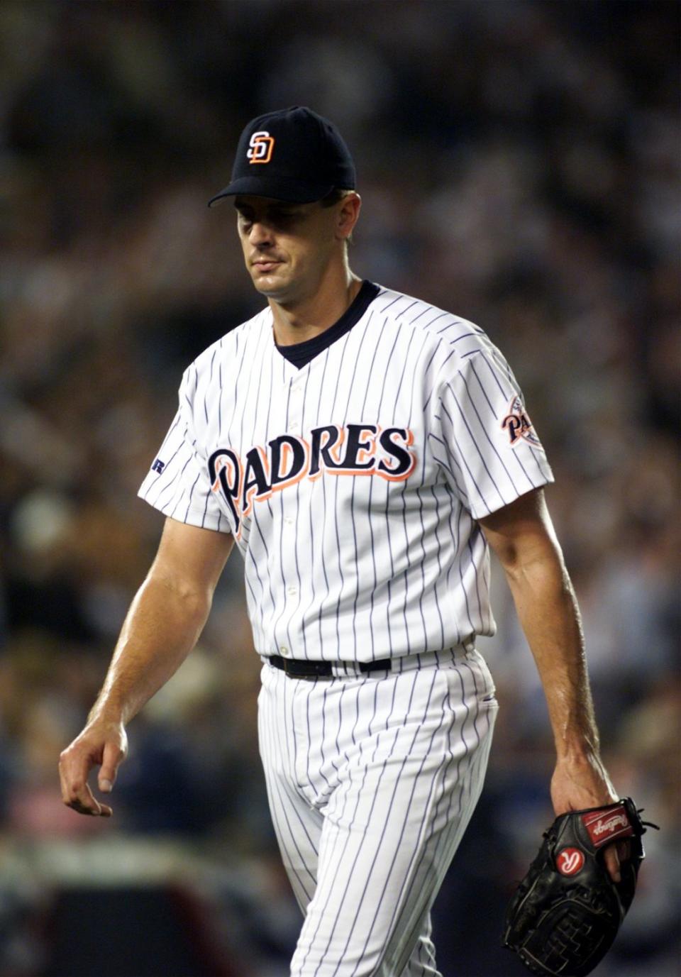 San Diego Padres pitcher Kevin Brown walks off the mound after giving up a home run.