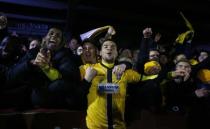 Britain Football Soccer - AFC Wimbledon v Sutton United - FA Cup Third Round Replay - The Cherry Red Records Stadium - 17/1/17 Sutton United fans celebrate with Maxime Biamou after the game Action Images via Reuters / Peter Cziborra Livepic