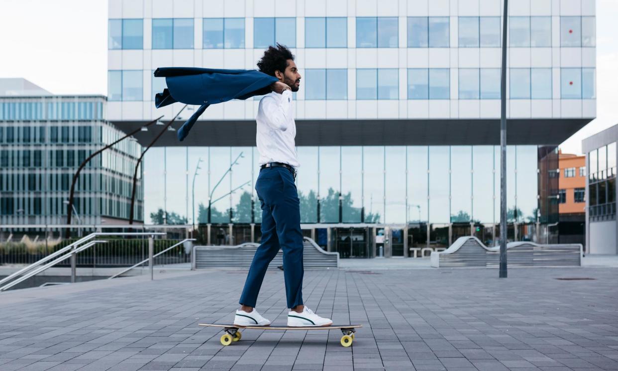 <span>Do you skateboard or rollerblade to work?</span><span>Photograph: Westend61/Getty Images</span>