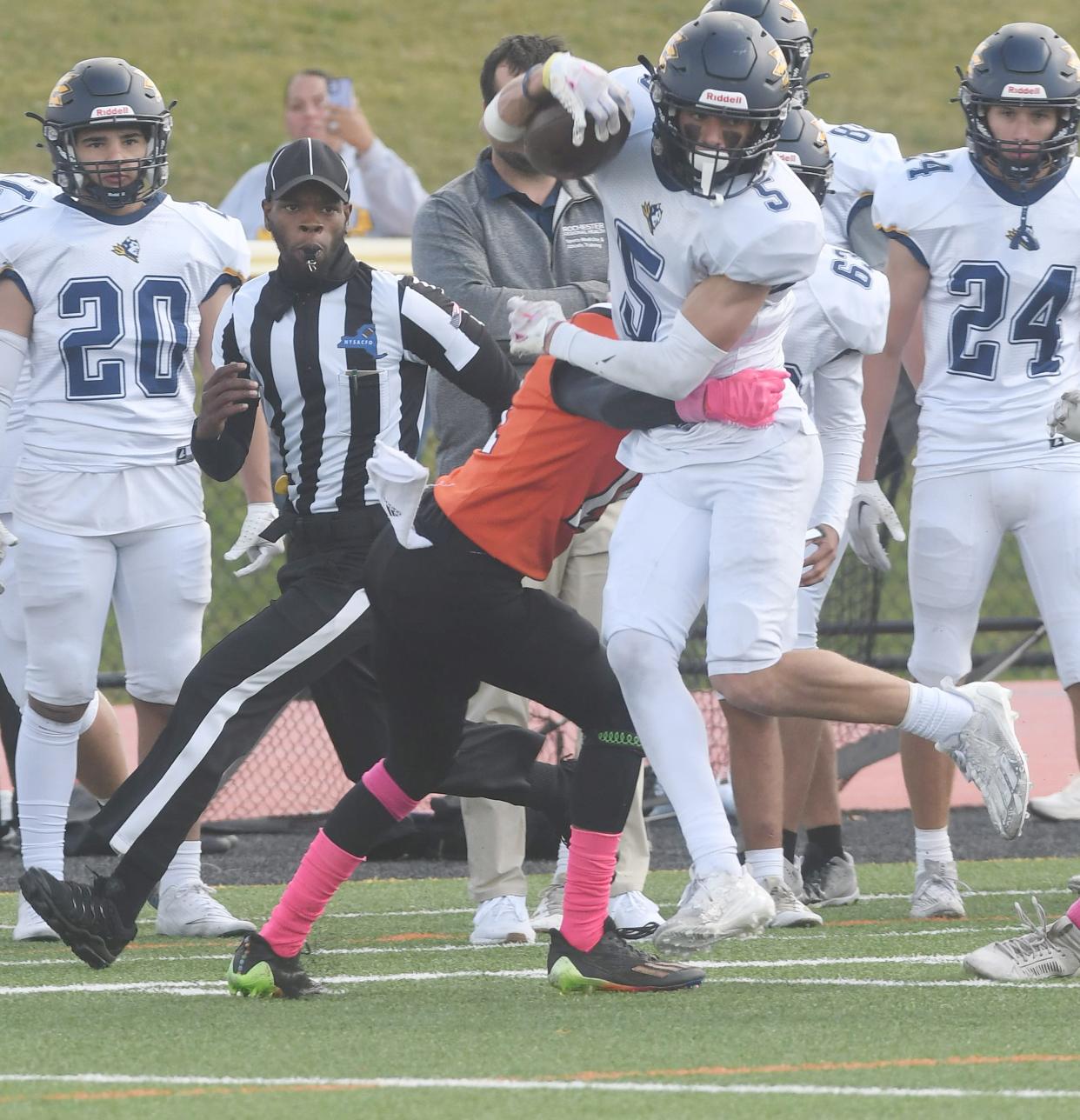 Adam Ruffalo of Victor tries to break out of a tackle against Churchville-Chili.