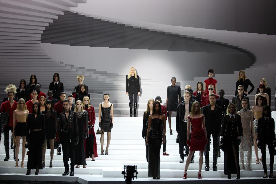 Donatella Versace takes her bow on Friday night in Milan.