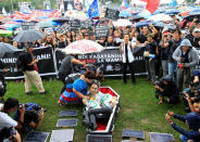 A protester impersonating former Philippine First Lady Imelda Marcos kisses an effigy of late dictator Ferdinand Marcos inside a mock coffin during a protest denouncing his burial inside the Libingan ng mga Bayani (Heroes' cemetery) last week, at Luneta park, metro Manila, Philippines November 25, 2016. REUTERS/Romeo Ranoco