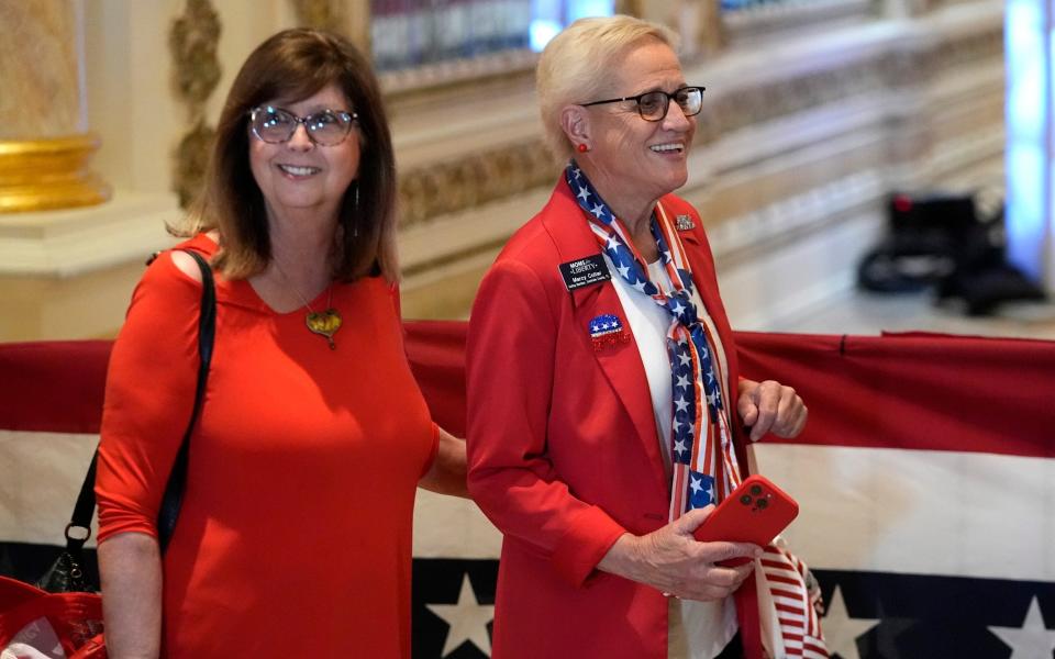 Guests arrive before Republican presidential candidate former President Donald Trump speaks at a Super Tuesday election night party