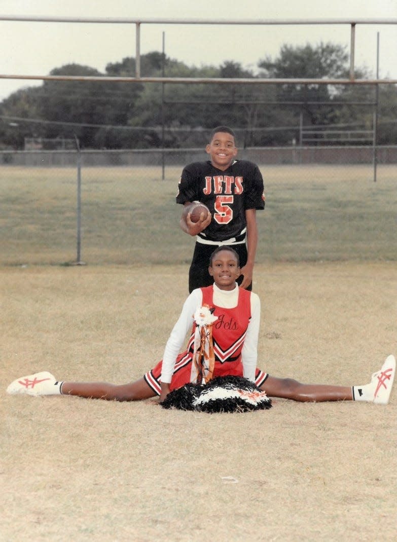 Nine-year-old Andre Emmett and his sister, 11-year-old Darra Oliver pose for a photo in 1991.