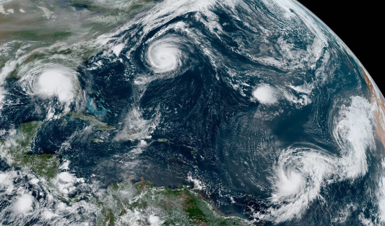 <span class="caption">Hurricanes Sally and Paulette, Tropical Depression Rene, and Tropical Storms Teddy and Vicky were all active on Sept. 14, 2020.</span> <span class="attribution"><a class="link " href="https://upload.wikimedia.org/wikipedia/commons/d/dd/Paulette%2C_Rene%2C_Sally%2C_Teddy_and_Vicky_2020-09-14_1550Z.jpg" rel="nofollow noopener" target="_blank" data-ylk="slk:NOAA;elm:context_link;itc:0;sec:content-canvas">NOAA</a></span>
