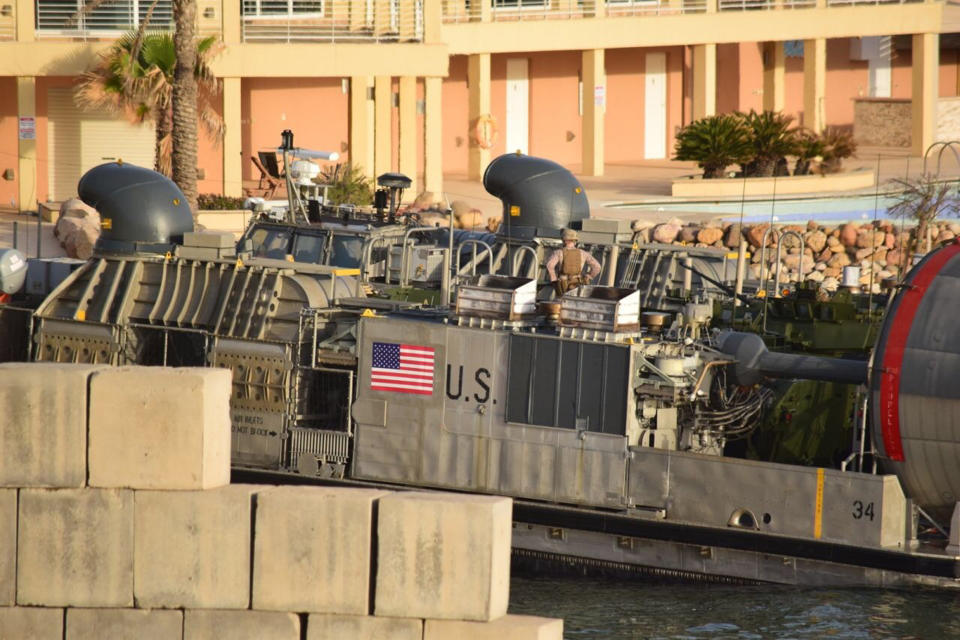 A U.S. amphibious hovercraft prepares to depart with evacuees from Janzur, west of Tripoli, Libya, Sunday, April 7, 2019. The United States says it has temporarily withdrawn some of its forces from Libya due to deteriorating security conditions. The pullout comes as a Libyan commander's forces advanced toward the capital of Tripoli and clashed with rival militias. A small contingent of American troops has been in Libya in recent years helping local forces combat Islamic State and al-Qaida militants and protecting diplomatic facilities. (AP Photo/Mohammed Omar Aburas)