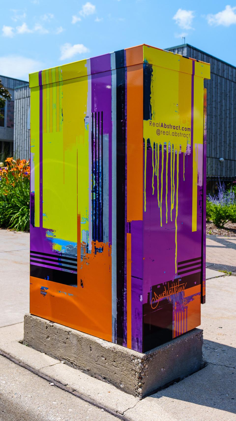 A utility box at 75th & Greenfield is wrapped with art by Dave Watkins as seen on Friday, July 21, 2023. The box is one of 11 selected for the City of West Allis public art utility box program.