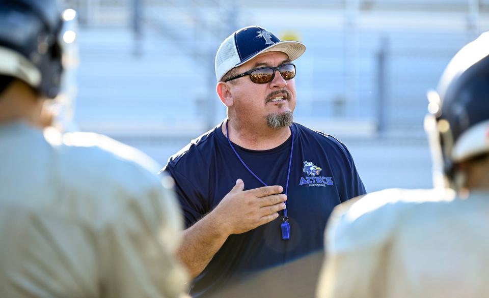 Bryan Rojas works with his team on Friday, July 28, 2023. Rojas is the new Head Football Coach for Farmersville High School.