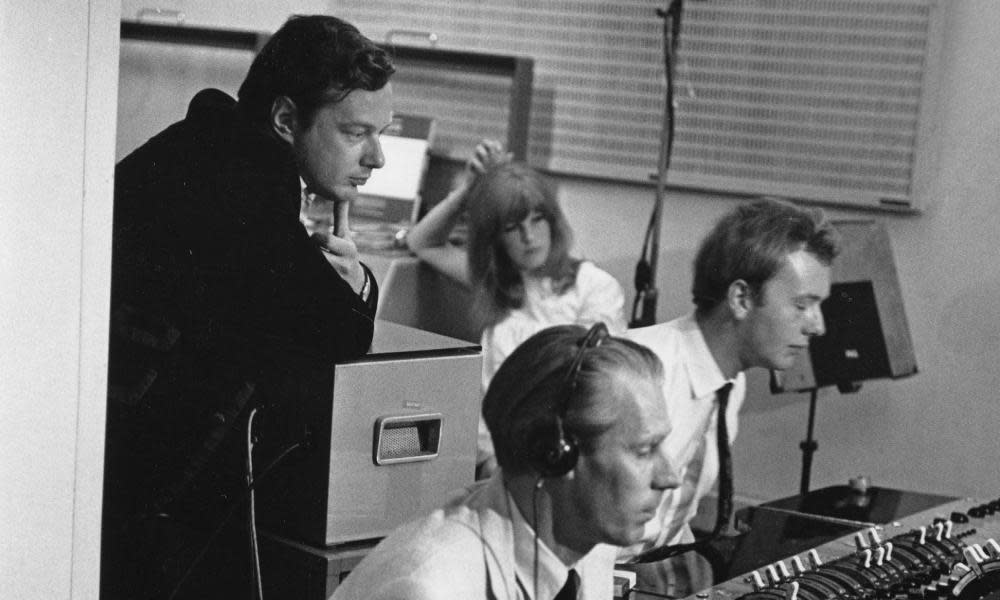 From left, Brian Epstein, George Martin and Geoff Emerick recording the Beatles at Abbey Road studios in 1967.