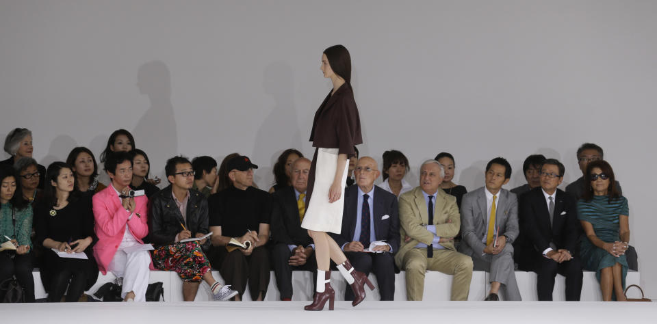 A model wears a creation part of the Jil Sander women's Spring-Summer 2013 collection that was presented in Milan, Italy, Saturday, Sept. 22, 2012. (AP Photo/Luca Bruno)