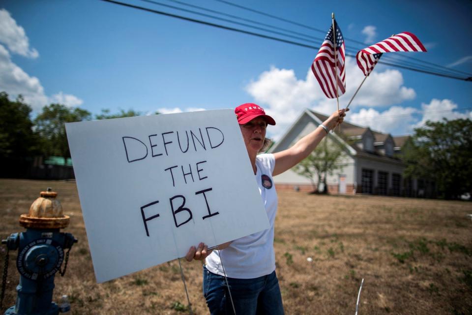 A Trump supporter protest near the Trump National Golf Club after former U.S. President Donald Trump said that FBI agents raided his Mar-a-Lago Palm Beach home, in Bedminster, New Jersey (REUTERS)