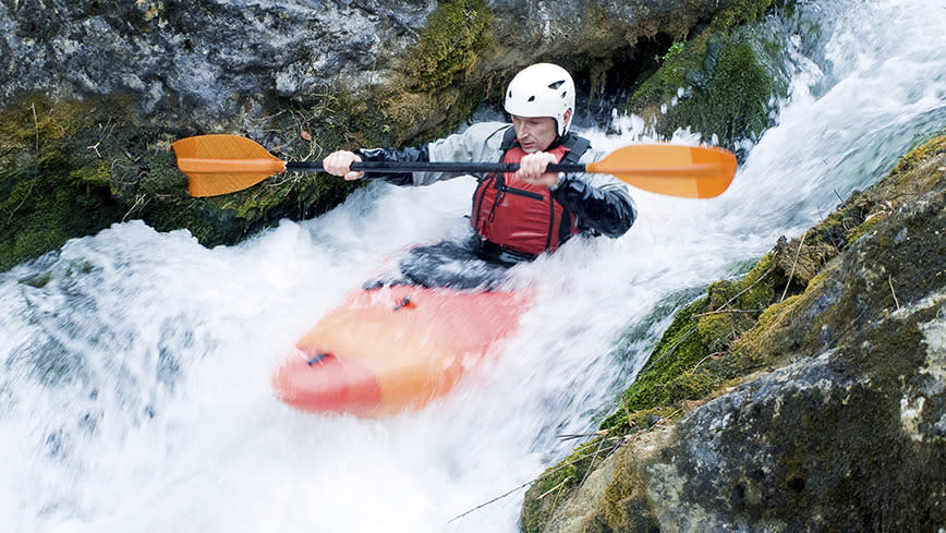 Kayaking the rapids. Photo: iStock