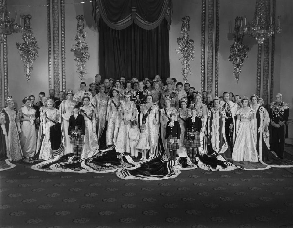 Queen Elizabeth II with Prince Philip, Duke of Edinburgh, Queen Elizabeth The Queen Mother, Princess Margaret Rose and members of the immediate and extended Royal Family, as well as foreign dignitaries, after her Coronation ceremony.<span class="copyright">Central Press/Getty Images</span>