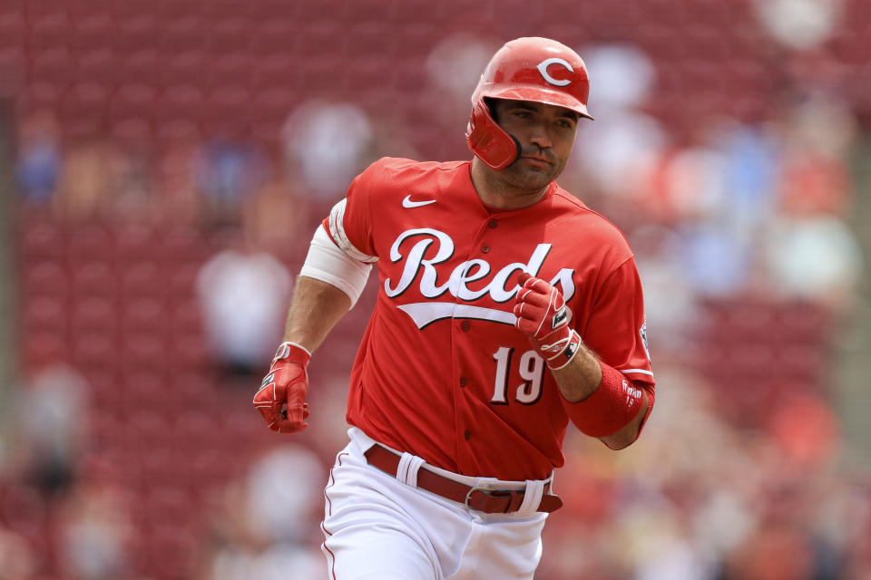 Cincinnati Reds' Joey Votto runs the bases after hitting a three-run home run during the third inning of a baseball game against the St. Louis Cardinals in Cincinnati, Sunday, July 24, 2022. (AP Photo/Aaron Doster)