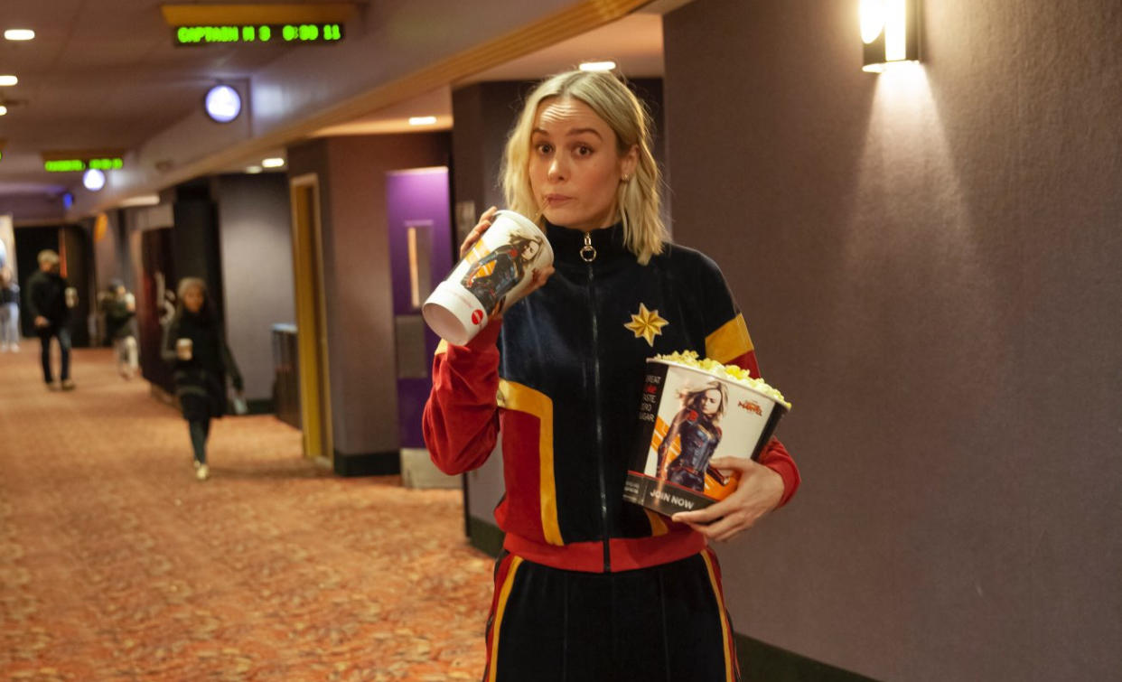 Brie Larson pops into an AMC cinema in Clifton, NJ, to watch a screening of ‘Captain Marvel’ with opening weekend audiences. (Credit: Twitter/@CaptainMarvel)