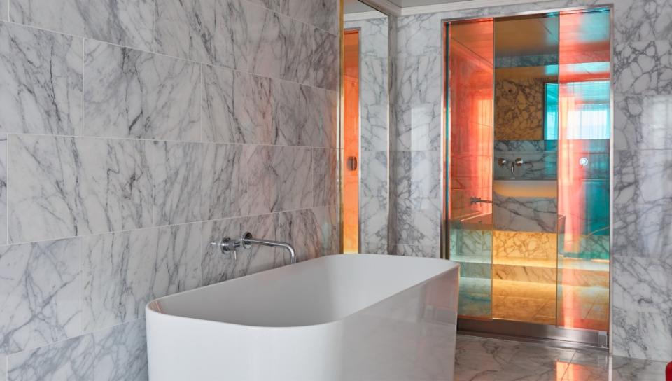 The Massive Suite bathroom featuring a full-size soaking bath tub.