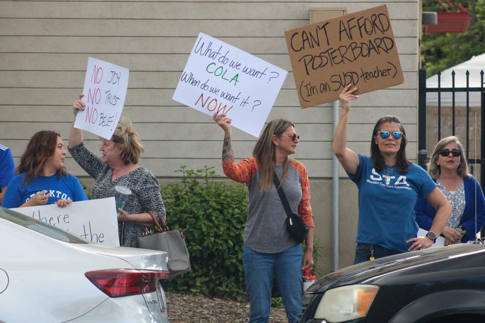 Members of the Stockton Teachers Association held a protest outside of the Stockton Unified School District headquarters on Tuesday, April 23, 2024.