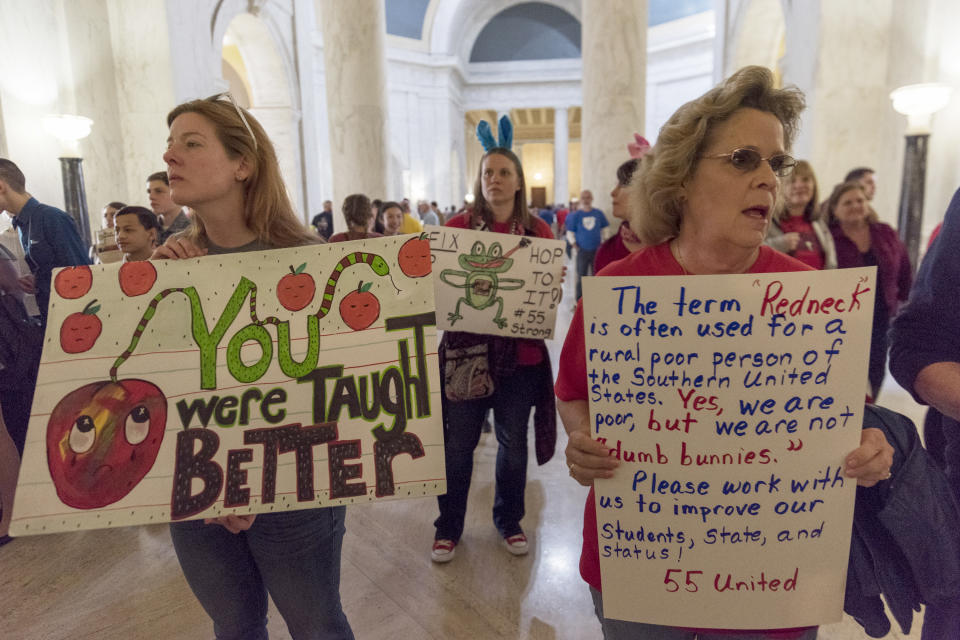 <p>From left, teachers Kim Hundley, Jamie Heflin and Susan Brewer demonstrate at the Capitol building on the fourth day of statewide walkouts in Charleston, W.Va., on Tuesday, Feb. 27, 2018. (Photo: Craig Hudson/Charleston Gazette-Mail via AP) </p>