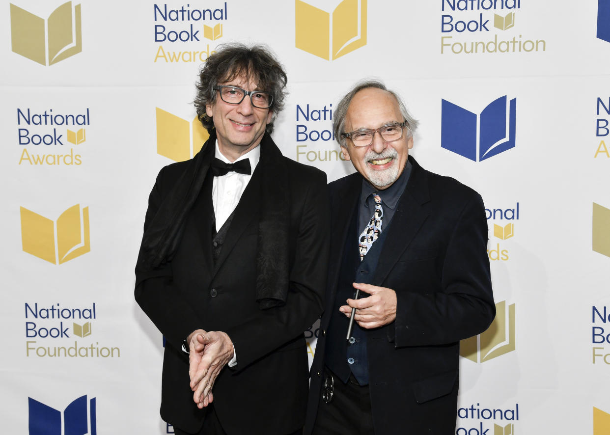 Lifetime Achievement honoree Art Spiegelman, right, and presenter Neil Gaiman attend the 73rd National Book Awards at Cipriani Wall Street on Wednesday, Nov. 16, 2022, in New York. (Photo by Evan Agostini/Invision/AP)