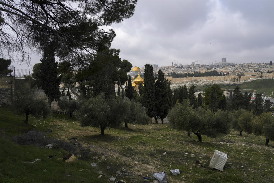 The Old City of Jerusalem is seen from the Mount of Olives, in East Jerusalem, Monday, Feb. 21, 2022. Israel's Nature and Parks Authority says it is backing down from a plan to encompass Christian holy sites on Jerusalem's Mount of Olives in a national park after vociferous outcry from major churches. (AP Photo/Mahmoud Illean)