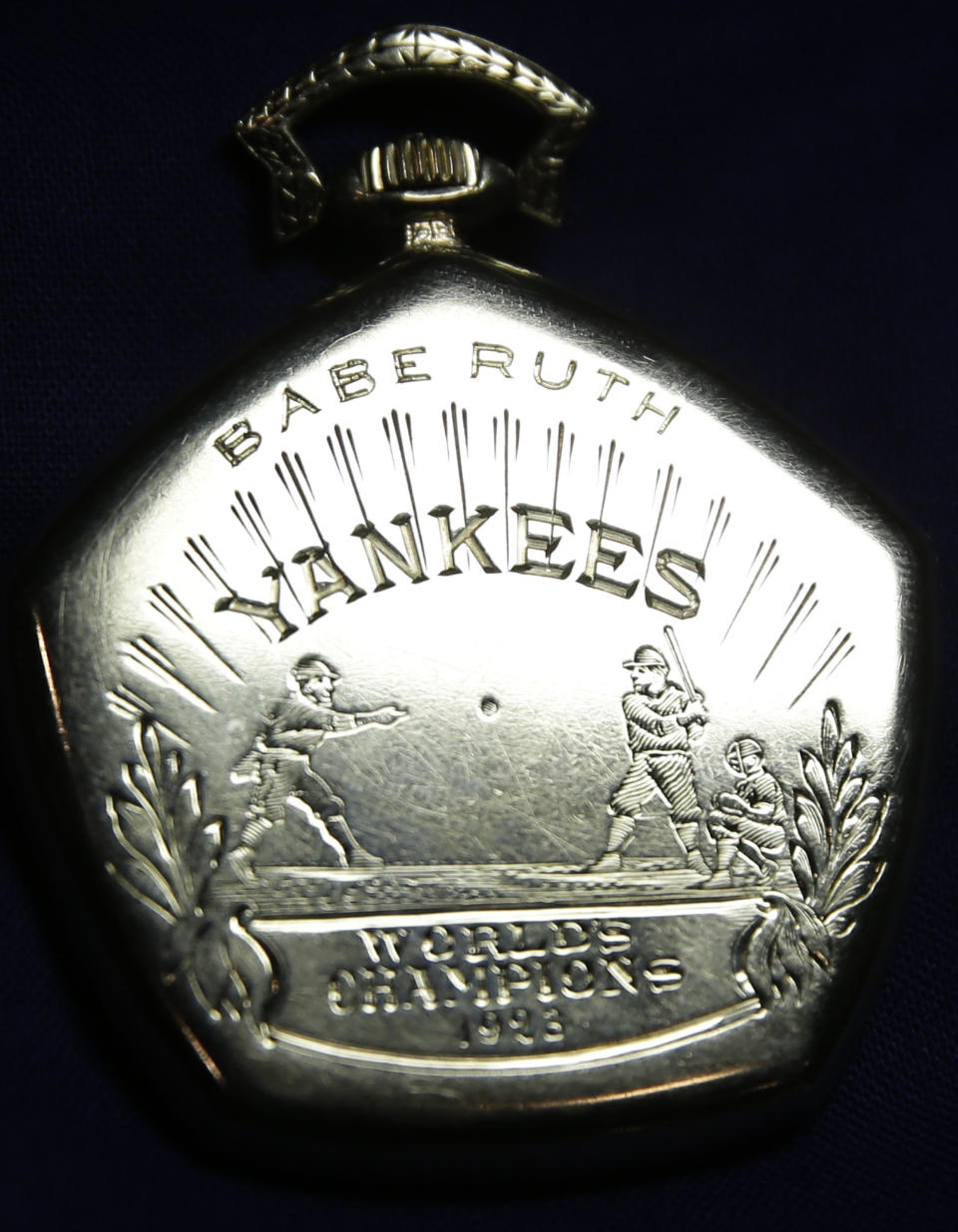 FILE - A pocket watch that was given to Babe Ruth in 1923 is displayed at Heritage Auctions office in Dallas, in this Jan. 22, 2014 file photo. The watch from the 1923 World Series sold for $717,000 Saturday Feb. 22, 2014 at auction in New York City. Ruth batted .368 and hit three home runs in the series, the first of the Yankees' 27 world championships. (AP Photo/LM Otero, File)