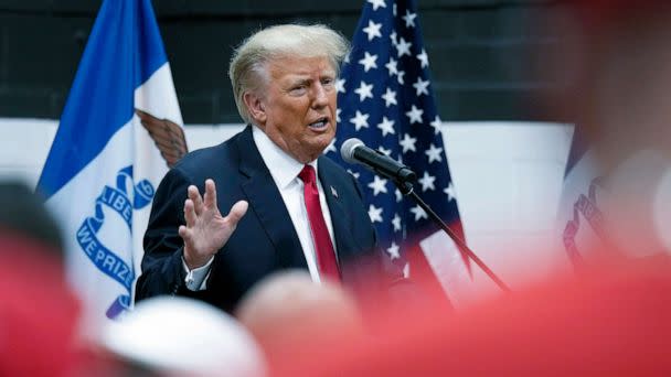 PHOTO: Former President Donald Trump visits with campaign volunteers at the Grimes Community Complex Park, June 1, 2023, in Des Moines, Iowa. (Charlie Neibergall/AP)