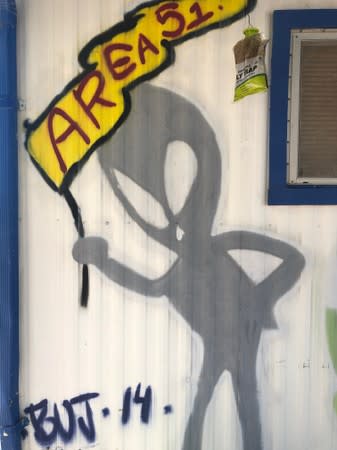 A mural is shown painted outside the A'Le'Inn Bar and Motel in Rachel, Nevada