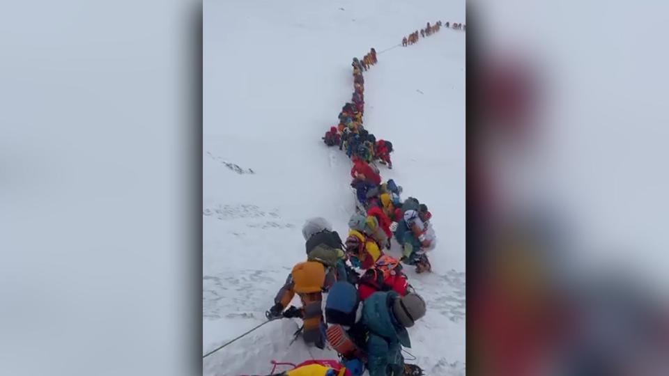 Climber line atop Mt. Everest