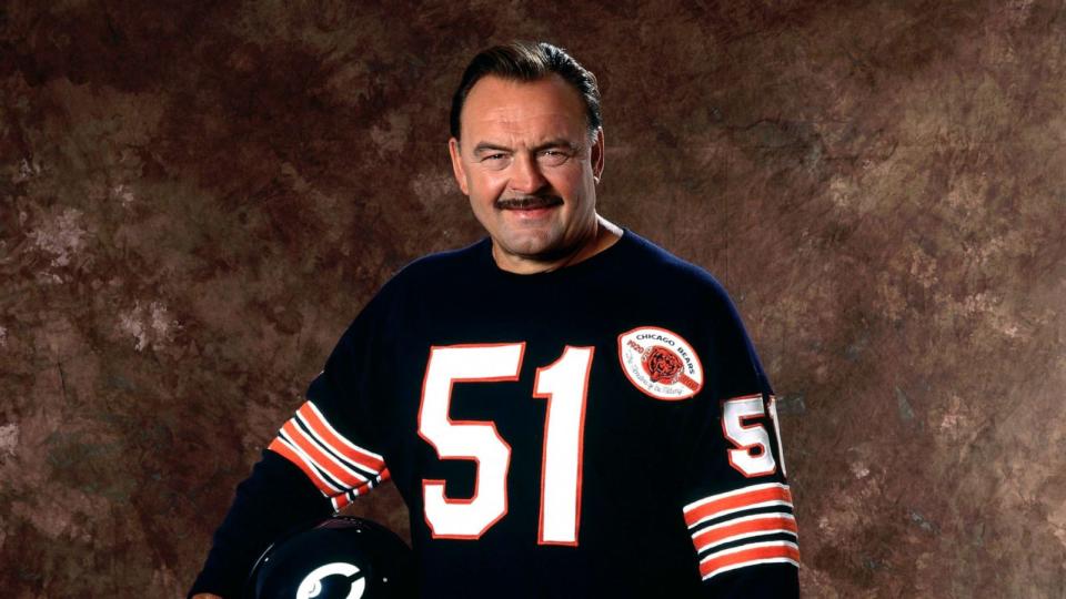 PHOTO: Retired Chicago Bears linebacker and Pro Football Hall of Famer Dick Butkus poses for photos on July 8, 1993. (Paul Spinelli via AP)