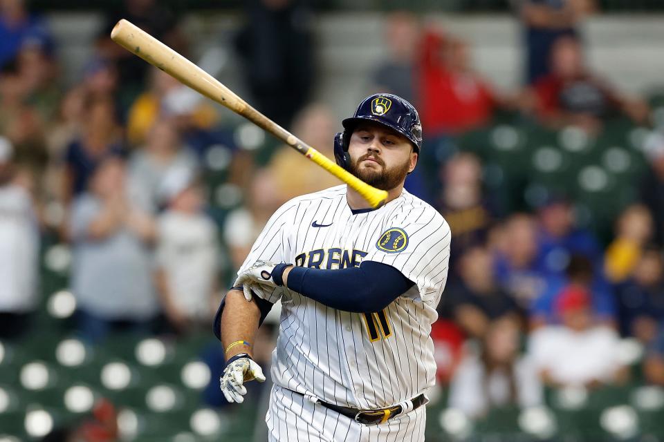 Milwaukee Brewers first baseman Rowdy Tellez throws his bat after making an out against the Miami Marlins on Sunday.