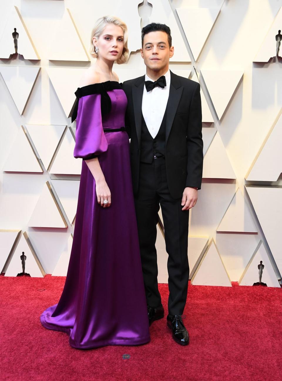 <p><a href="https://www.elle.com/uk/life-and-culture/g26509306/oscars-2019-cutest-couples-red-carpet/" rel="nofollow noopener" target="_blank" data-ylk="slk:For the big night;elm:context_link;itc:0;sec:content-canvas" class="link ">For the big night</a> at the end of February, Malek (who scooped the best actor award) wore a three-piece tuxedo while the film's leading actress wore an off-the-shoulder purple floor-length gown by Rodarte.</p>