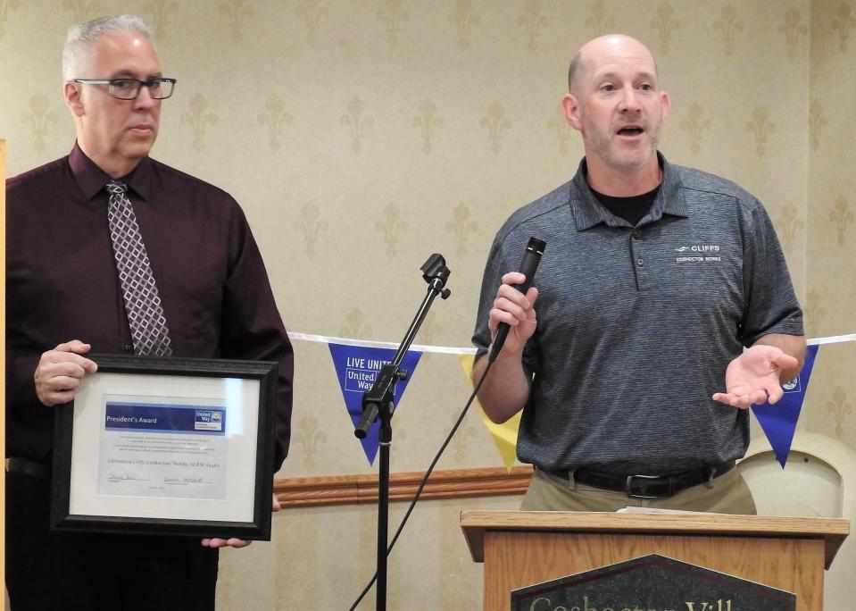 United Way of Coshocton County Board President Steve Oster with Troy Balo of Cleveland Cliffs. The Coshocton plant received the President's Award for donating more than $10,000 during the current campaign and it will serve as the corporate sponsor for the 2023 to 2024 campaign.