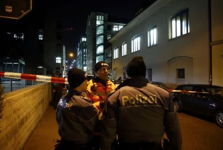 Police stand outside an Islamic center in central Zurich, Switzerland December 19, 2016. REUTERS/Arnd Wiegmann