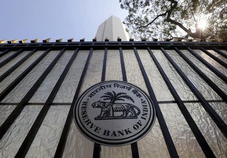 The Reserve Bank of India (RBI) seal is pictured on a gate outside the RBI headquarters in Mumbai, India, February 2, 2016. REUTERS/Danish Siddiqui