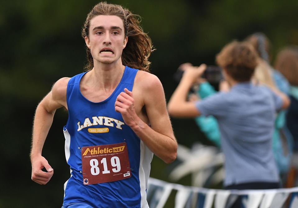 Laney’s Daniel Kelmer comes in first place in the 2023 Mideastern Conference Cross Country championship Thursday Oct. 12, 2023 at Olsen Park in Wilmington, N.C. KEN BLEVINS/STARNEWS