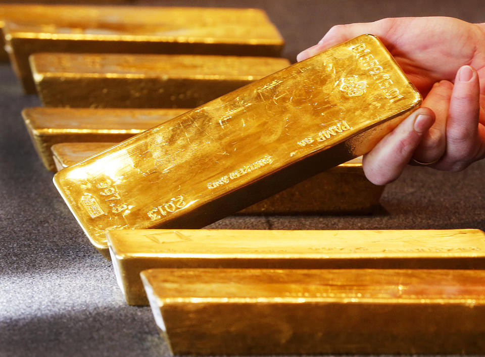 Various gold bars, are displayed in the German central bank's headquarters in Frankfurt, Germany, Thursday, Feb. 9, 2017.  Germany's central bank has completed an effort to bring home 300 tons of gold stashed in the United States, part of a plan to repatriate gold bars kept abroad during the Cold War.  (AP Photo/Michael Probst)