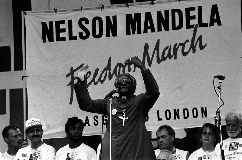 Tutu addressing the Nelson Mandela Freedom Rally in Hyde Park, London, in 1988 (PA) (PA Wire)