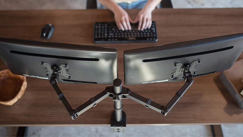 A monitor arm to adjust your screen position freely