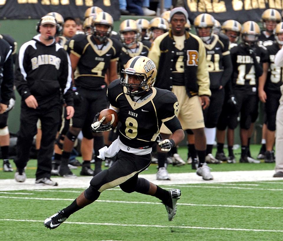 Rider's Domanic Thrasher (8) cuts up the field against Frenship during the Region I-4A Finals at Memorial Stadium on Dec. 8, 2012.