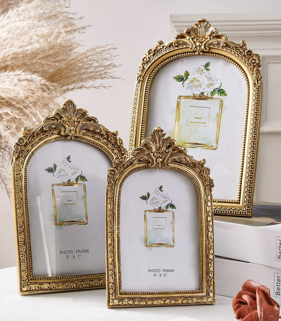 <p><a href="https://go.redirectingat.com?id=74968X1596630&url=https%3A%2F%2Fus.shein.com%2F1pc-Vintage-European-Style-Gold-Curved-Frame-Decorative-Photo-Frame-With-One-Random-Inner-Paper-For-Home-Decoration-And-Picture-Display-p-24256150-cat-3469.html%3FmallCode%3D1%26imgRatio%3D3-4&sref=https%3A%2F%2Fwww.elle.com%2Ffashion%2Fshopping%2Fg44755623%2Fbest-home-decor-gifts%2F" rel="nofollow noopener" target="_blank" data-ylk="slk:Shop Now;elm:context_link;itc:0;sec:content-canvas" class="link rapid-noclick-resp">Shop Now</a></p><p>Vintage European Style Gold Decorative Frame</p><p>us.shein.com</p><p>$9.60</p>