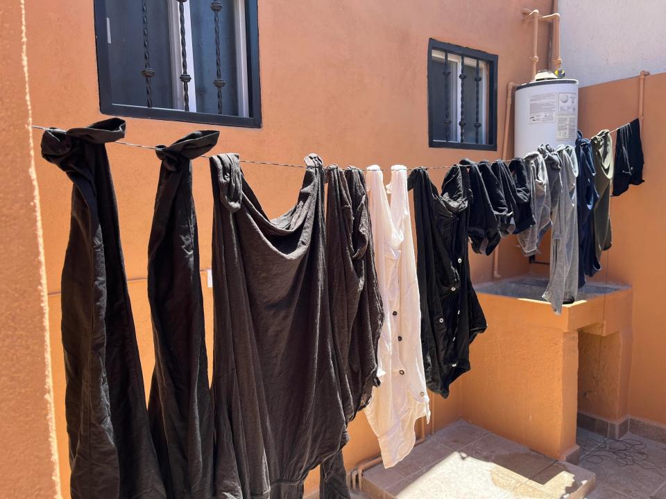 clothes hanging outside on a clothesline
