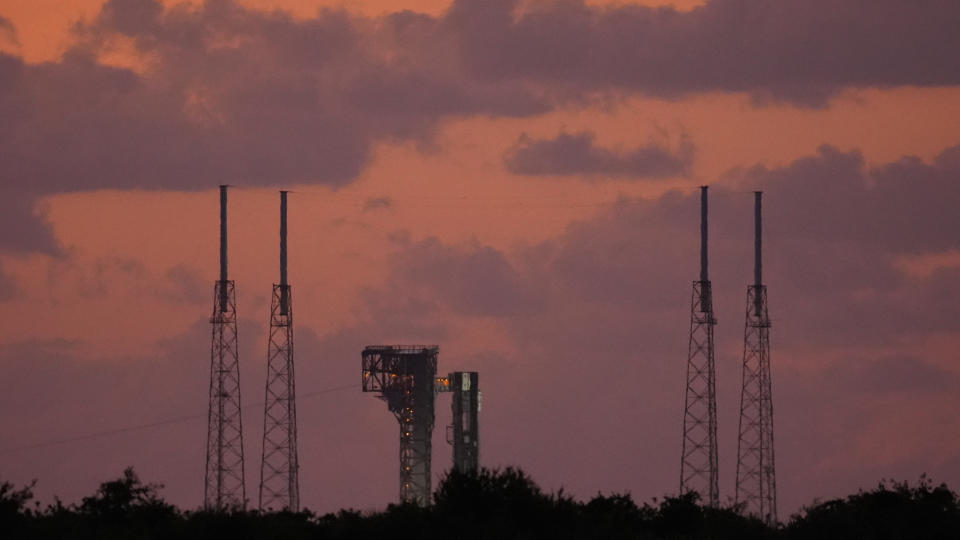 Boeing's Starliner capsule, atop an Atlas V rocket, sits on the launch pad during sunrise at Space Launch Complex 41 Saturday, June 1, 2024, in Cape Canaveral, Fla. NASA astronauts Butch Wilmore and Suni Williams will launch aboard the rocket to the International Space Station, scheduled for liftoff later Saturday. (AP Photo/Chris O'Meara)