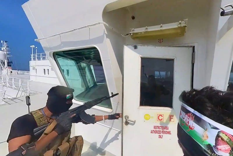 Images released by Yemen's Houthi group on November 20 show Houthi militants as they hijack a cargo ship reportedly owned by an Israeli businessman near Yemen in the southern Red Sea the day before. File Photo courtesy of Houthi Group Press Service