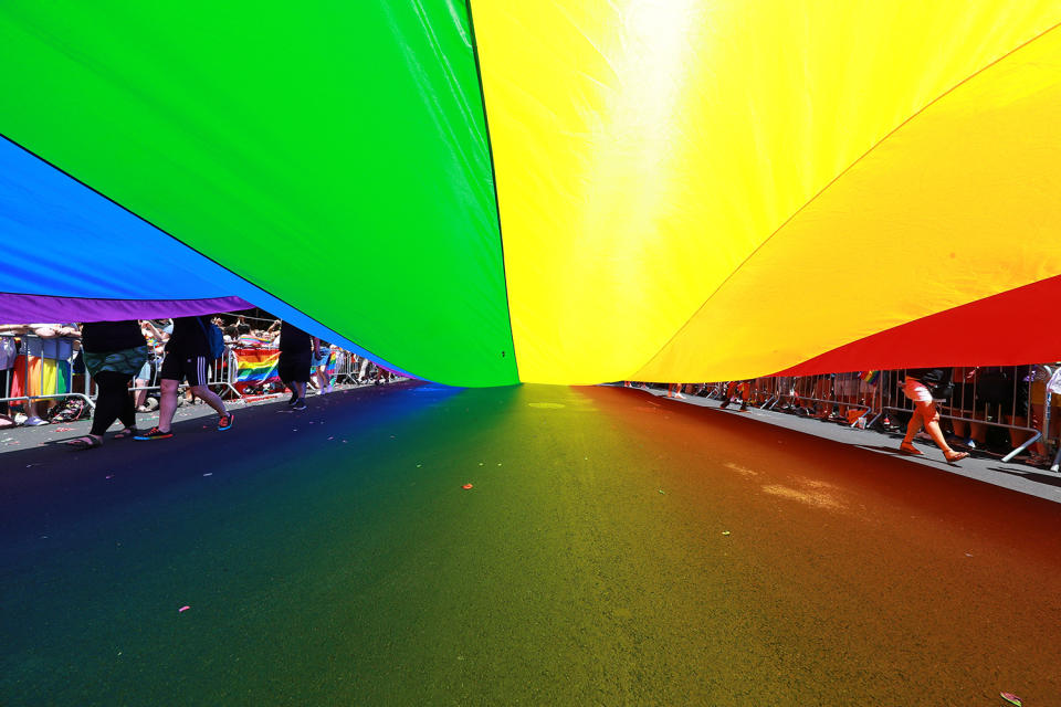 The rainbow color flag is draped over 5th Ave. during the N.Y.C. Pride Parade in New York on June 30, 2019. (Photo: Gordon Donovan/Yahoo News)