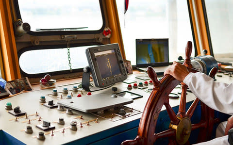 The captain's deck on board a ship - Credit: AP