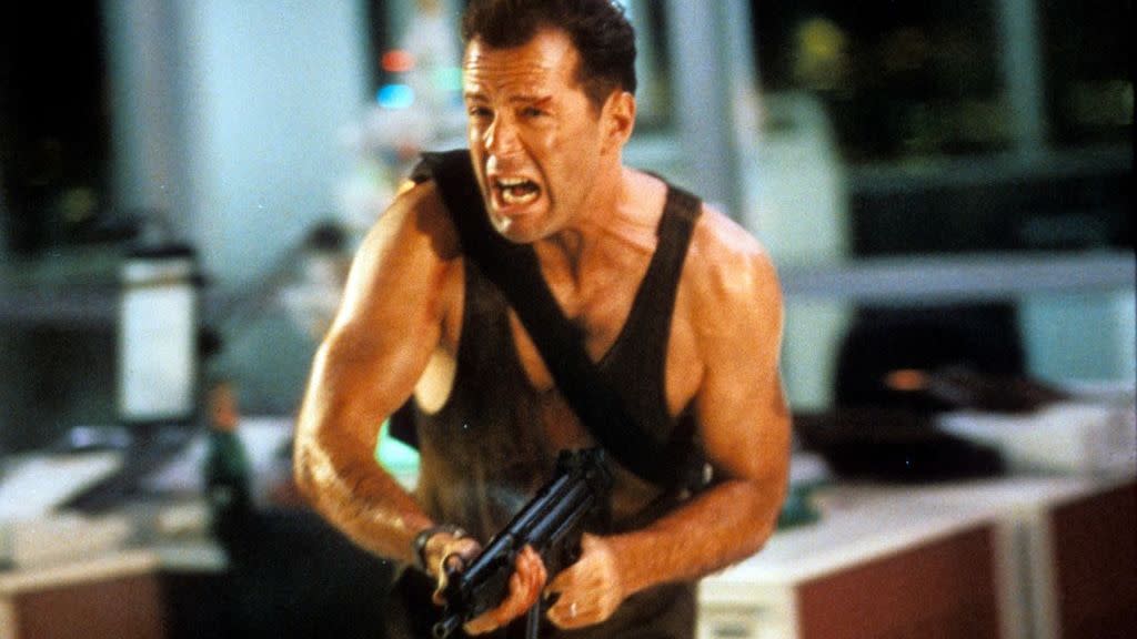 bruce willis running with automatic weapon in a scene from the film die hard, 1988 photo by 20th century foxgetty images