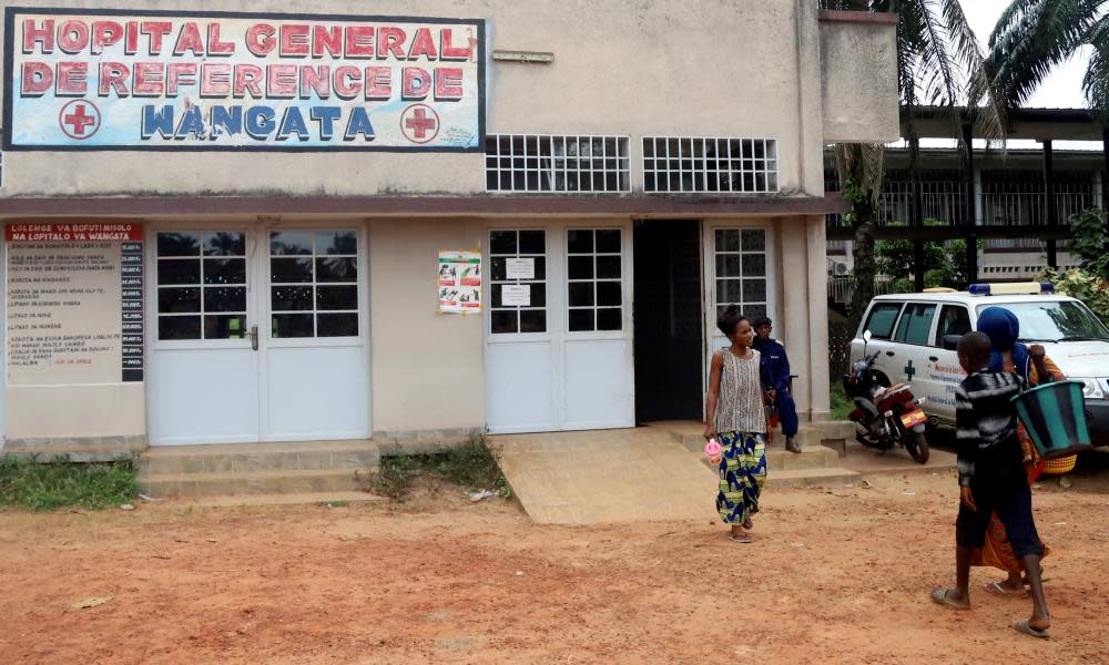 Residents arrive at the Wangata Reference hospital in Mbandaka