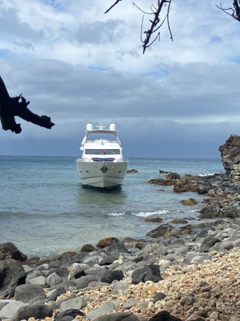 The 94-foot private yacht ran aground on rocks and reef on Monday.