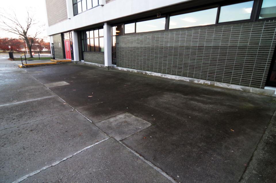 The approximate spot outside Brockton High School, pictured on Thursday, Nov. 18, 2021, where a Brockton school police officer put his knee on a suspect's back during an altercation on Nov. 17.