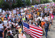 <p>Counterprotesters march down Tremont Street heading toward the Boston Common for the “Boston Free Speech” rally and counterprotest in Boston, Aug. 19, 2017. (Photo: John Tlumacki/The Boston Globe via Getty Images) </p>